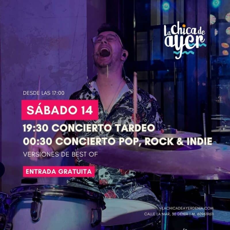 Baterista tocando en concierto con luces violetas