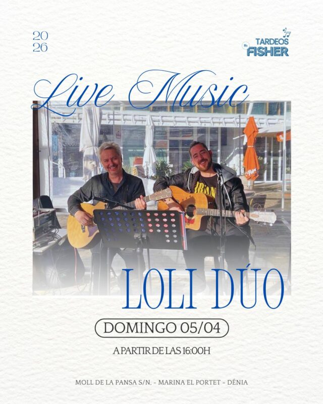 Dúo musical tocando guitarras en directo