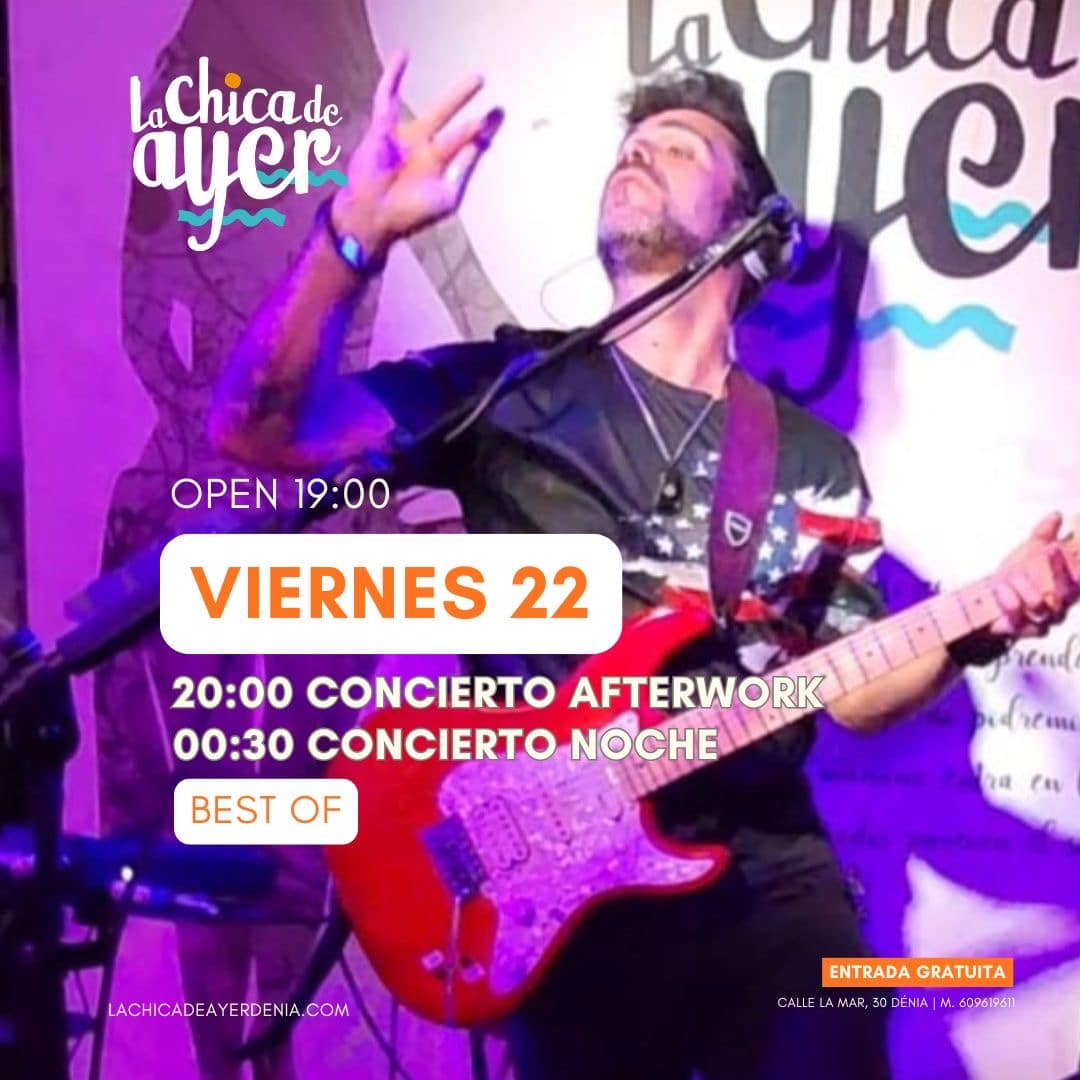 Músico tocando guitarra eléctrica en concierto en vivo